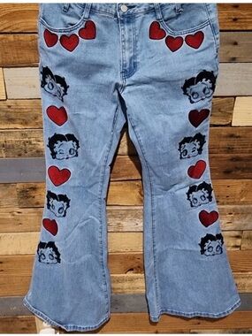 Dolls Kill Light Blue Flared Jeans with Red Heart & Betty boop faces